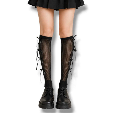 Knee High Socks with Long Bow Ribbons featuring ribbed knit texture and oversized satin bow details