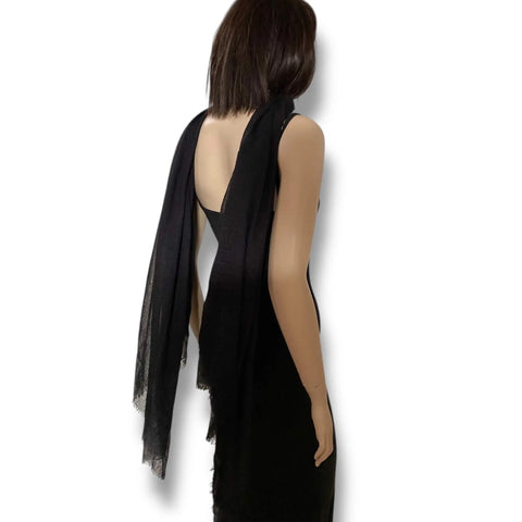 Black oversized cotton scarf cloak styled as a neck wrap, shoulder shawl and hooded layering piece