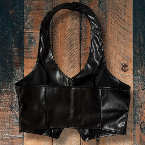 Black Faux Leather Button Up Cropped Halter Vest  back view on wood floor background