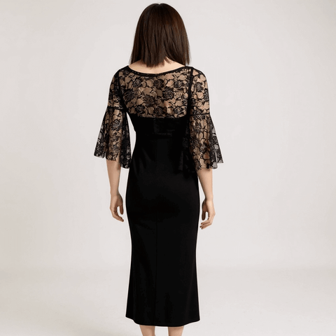 Woman wearing black Lace V Neck Bell Sleeve Front Tie Lace Cropped Top back view