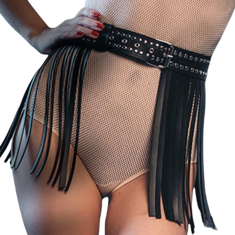Black studded short tassel belt with silver grommets and fringe detailing – wide faux leather adjustable belt for punk, gothic, western, or boho festival outfits.