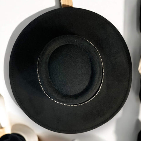 Black Wide Brim Studded Fedora Hat  handing on wall for crown to be seen