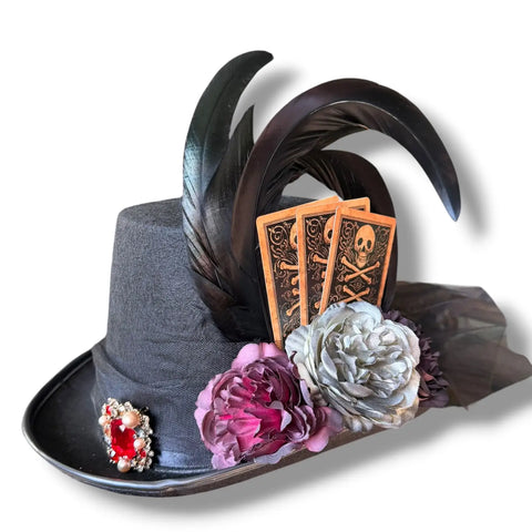 Victorian black top hat with rooster feathers, peonies, tulle bow, skull cards and red crystal brooch