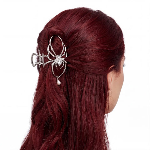 Silver spider hair claw clip with rhinestone body, elongated legs and dangling faux pearl accents