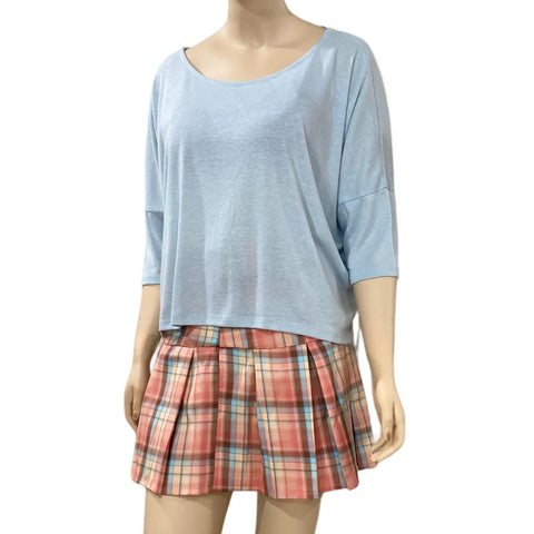 Blue wide boxy top with scoop neckline, dolman sleeves and adjustable lace-up side panels