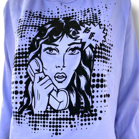 close-up of velvet sassy girl graphic detail on long sleeve top
