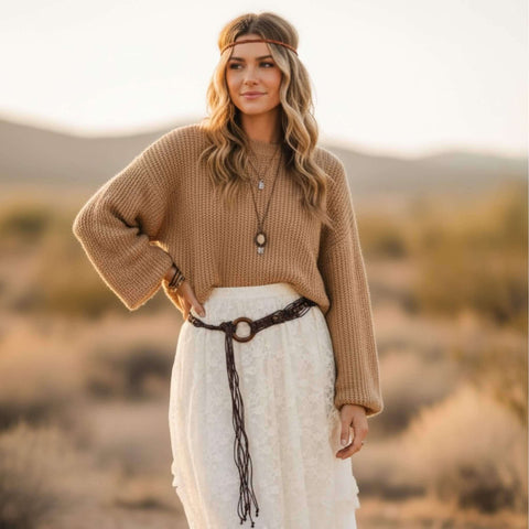 brown braided beaded tassel belt with wood ring buckle styled at the waist over a boho dress