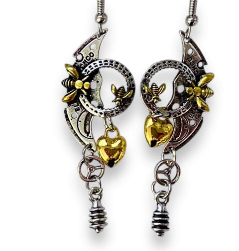 Mix metal steampunk earrings with silver and gold heart, bee, and gear charms – industrial dangle earrings for punk and whimsygoth style