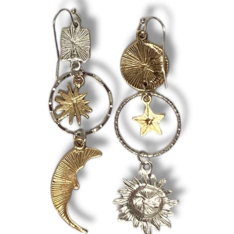 Cosmic sun moon star dangle earrings in silver and gold. Asymmetrical celestial charms with boho Y2K, witchy, gothic fashion influence. Lightweight drop earrings.
