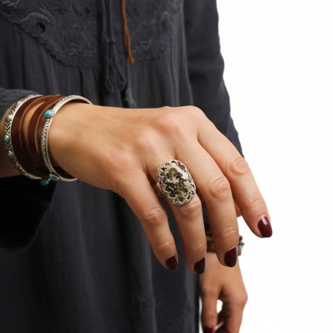 Custom Ocean Jasper ring with natural orbicular stone, sterling silver fleur-de-lis bezel and hammered band
