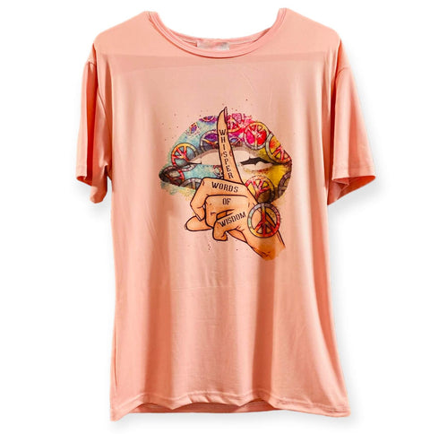 Close-up of multicolored peace and lips graphic on tee