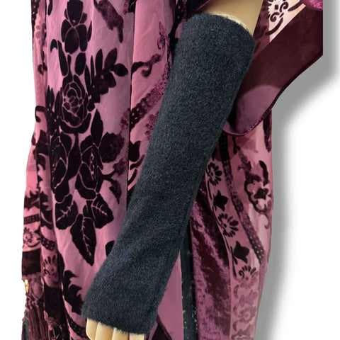 Black fuzzy soft fingerless arm warmers gloves with thumb holes in velvet-feel fleece, adjustable scrunch or elbow-length forearm coverage