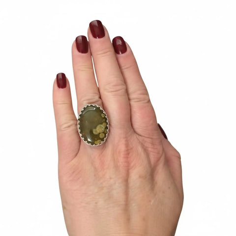 Large Fossil Jasper sterling silver ring with green-yellow cabochon, crown bezel and floral textured band 8.75