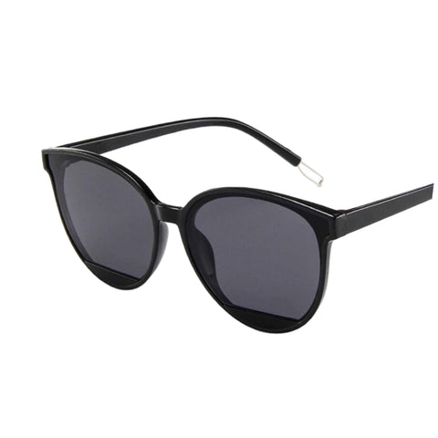 Large round cat eye sunglasses with waterline-textured lenses and metallic legs – bold retro style for festivals, skiing, or streetwear looks