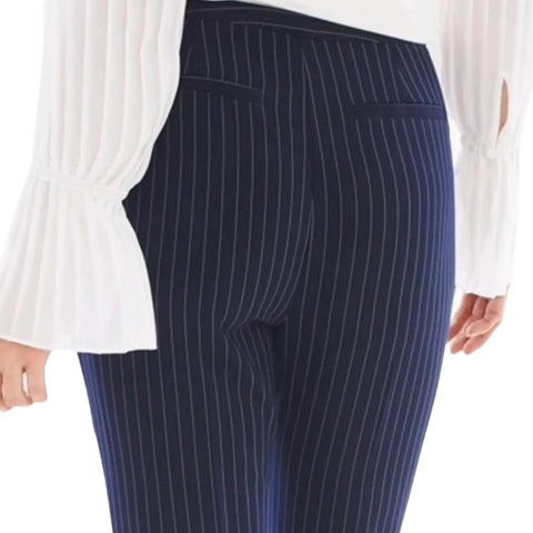 Navy blue pinstripe mid-rise ankle trousers by Chico's with slim tapered legs and zip-front closure close up back view
