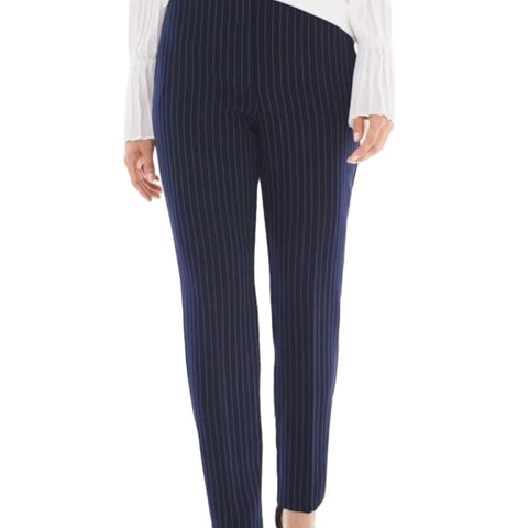 Navy blue pinstripe mid-rise ankle trousers by Chico's with slim tapered legs and zip-front closure walking forward