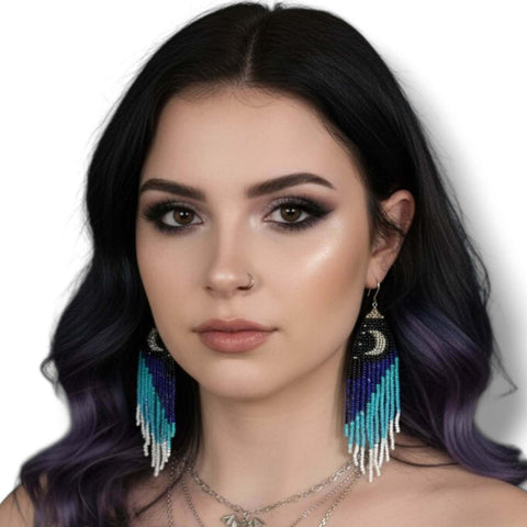 Model wearing Moon & Stars Beaded Fringe Earrings featuring crescent moon and star design in vibrant colors.