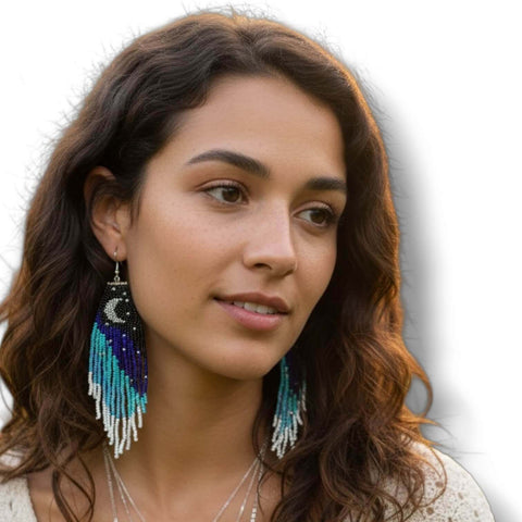 Moon & Stars Beaded Fringe Earrings worn by a woman with curly hair, showcasing the stunning crescent moon and fringe design.