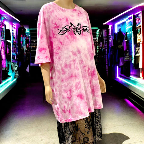front view of oversized pink and white tie dye tee on model