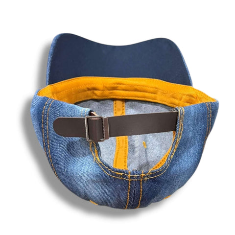 Dark blue denim baseball cap with rhinestone star and silver stud detailing on front and brim, curved stiff brim, adjustable back strap, head size 21 to 24 inches