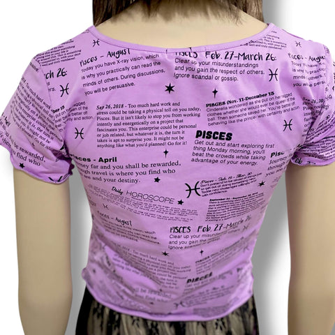 short sleeve graphic pisces baby tee in lilac purple with black zodiac print, fitted crop top with lettuce trim