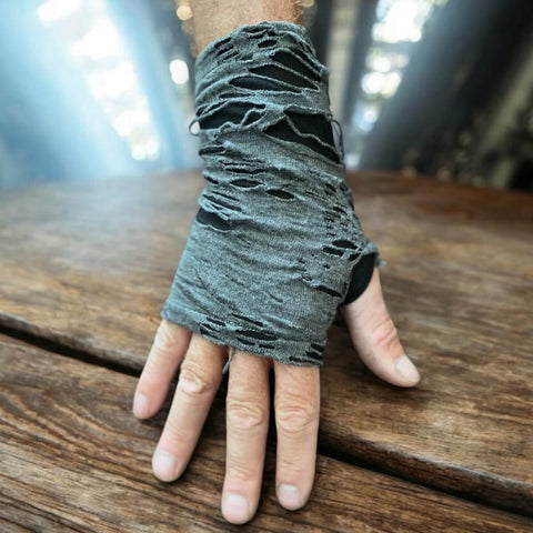 man wearing pair of Shredded  ripped black gray arm covers fingerless thumbhole design unisex/osfm