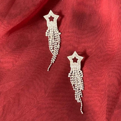 Silver Star Sparkle Long Tassel Earrings with burgundy background