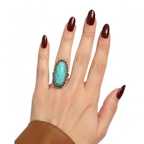 Silver Braided Oval Turquoise Statement Ring worn on ring finger size 7