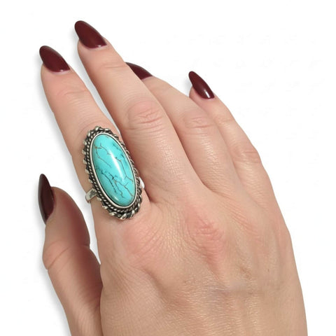Silver Braided Oval Turquoise Statement Ring worn on index finger size 8