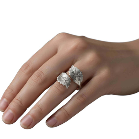 Women's Silver Double Leaf Wrap Ring with textured leaf detail and adjustable open band boho nature inspired style
