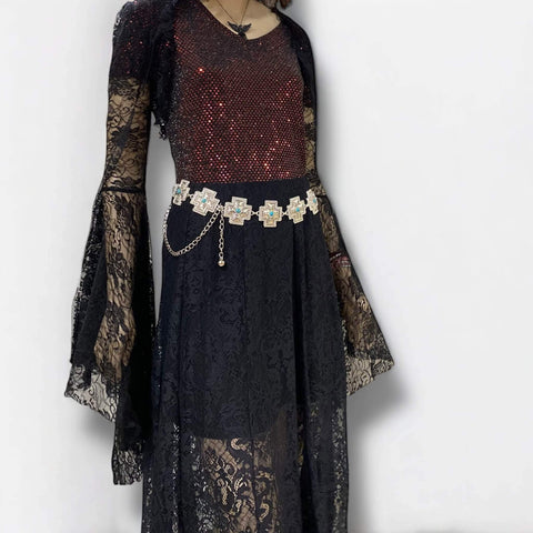 Silver turquoise cross western chain belt with textured cross medallion links and green faux turquoise centers, adjustable clasp closure, worn at waist or hips.