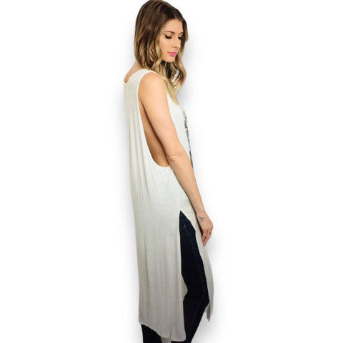 sleeveless off-white long tunic with metallic heart graphic and high side slits