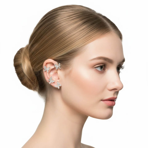 woman wearing right ear Sparkle Butterfly Ear Cuff Wrap Set Earrings with non-pierced cuffs and glittery wings women's / osfm