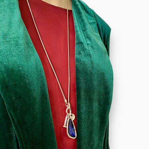 Silver talisman crystal pendant necklace with bold blue-purple faceted stone on silver toggle snake chain, mystical and adjustable statement jewelry piece.