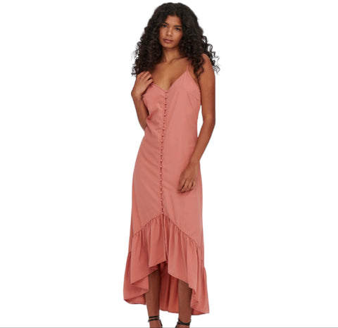 Rose pink sleeveless maxi dress with button-down front, crisscross back, and high-low ruffle hem, styled for boho western summer fashion