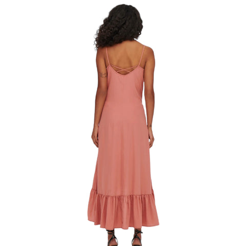 Rose pink sleeveless maxi dress with button-down front, crisscross back, and high-low ruffle hem, styled for boho western summer fashion