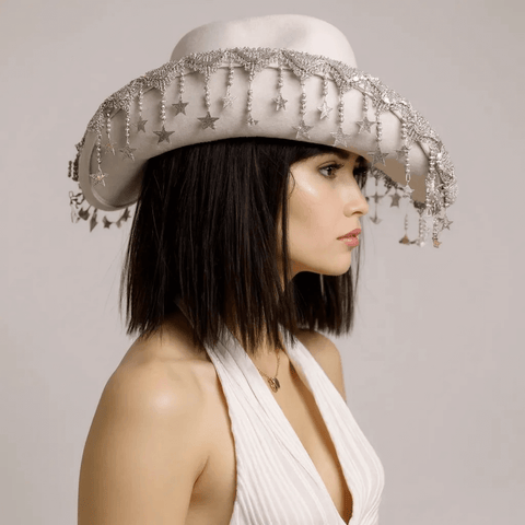 festival outfit styled with white tassel stars cowboy hat