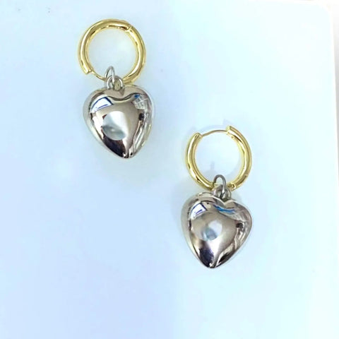 Two Tone Heart Hoop Earrings with gold hoops and silver puffy heart charms