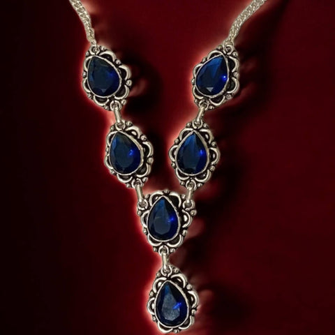 Victorian sterling silver Y necklace with dark royal blue pear crystals and matching drop earrings