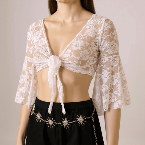 Woman wearing a whiteV Neck Front Tie Lace Bolero Cardigan