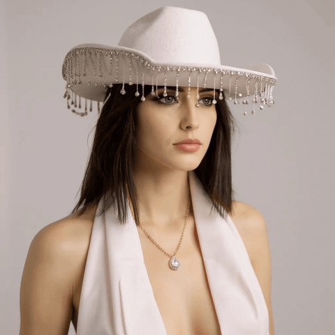 festival outfit styled with white diamond fringe cowboy hat