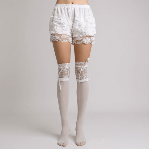 lace-top over-knee white stockings styled with ribbon closure wearing ruffle bloomers