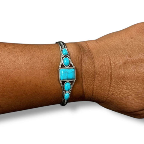 Wild West silver turquoise cuff bracelet with five faux turquoise cabochons in mixed shapes, antique silver braided band, adjustable southwestern boho cowgirl jewelry