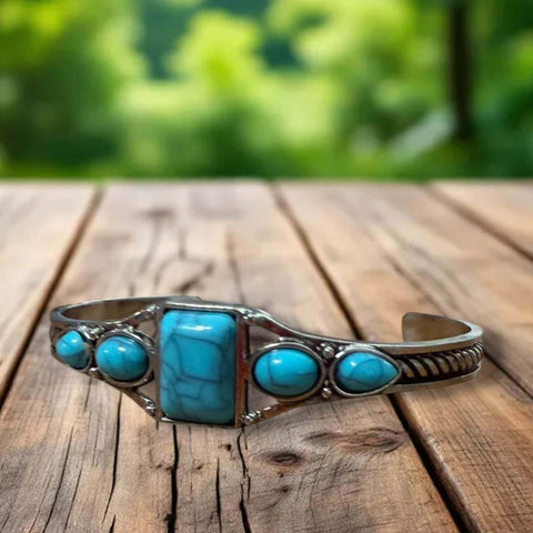 Wild West silver turquoise cuff bracelet with five faux turquoise cabochons in mixed shapes, antique silver braided band, adjustable southwestern boho cowgirl jewelry