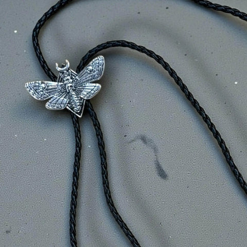 Antique Silver Skull Moth Bolo Tie with moon accents and braided leather cord western goth neckwear