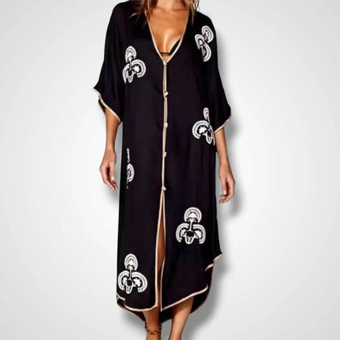 Black Button Down Embroidered Moroccan Kaftan with white embroidery, gold trim, and abalone shell buttons