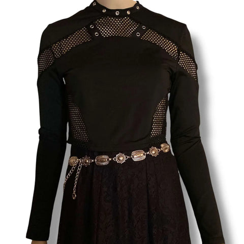 Black cut out mesh studs cropped top with fishnet panel sleeves, silver grommet neckline straps, and keyhole back button closure, women’s fitted size large