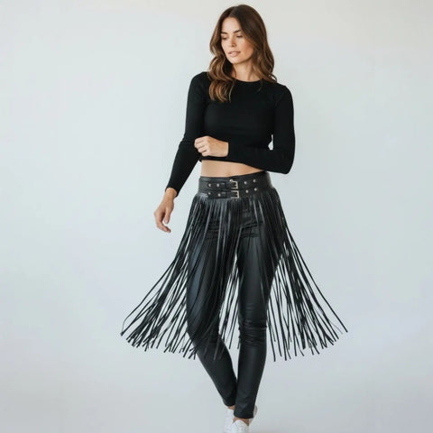 Model showcasing a Black Leather Long Fringe Statement Belt over sleek black outfit with flowing fringes.