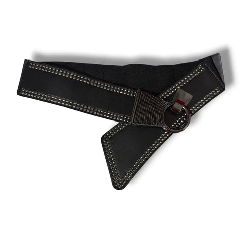 Black Leather Studded Waist Statement Belt with gunmetal studs, asymmetrical front, hook buckle, and elastic back panel flat lay 