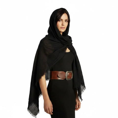 Black oversized cotton scarf cloak styled as a neck wrap, shoulder shawl and hooded layering piece